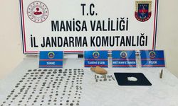 Manisa'da bir evde 180 parça tarihi eser ele geçirildi