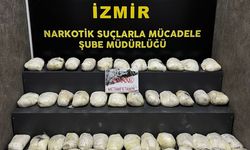 İzmir'de tırın lastiğine gizlenmiş 50 kilo 550 gram uyuşturucu ele geçirildi