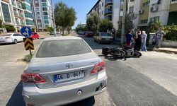 Nazilli'de otomobil ile çarpışan motosikletteki 3 kişi yaralandı