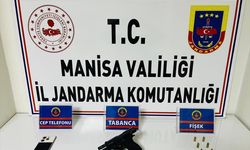 Salihli'de ruhsatsız tabancayla yakalanan şüpheliye adli işlem