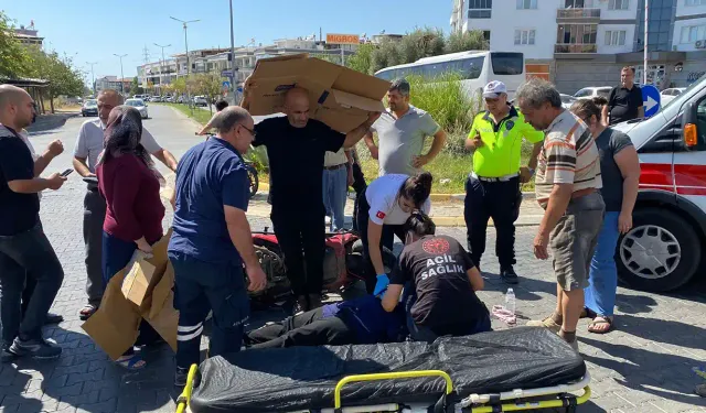 Aydın'da kazada yaralanan kadın ambulans gelene kadar kartonla güneşten korundu